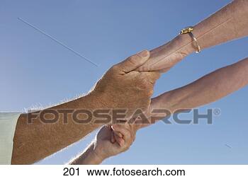 Stock Photography - mature couple 
holding hands, 
 close-up of hands, 
 side view,  low. 
fotosearch - search 
stock photos, 
pictures, images, 
and photo clipart