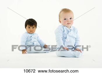 Stock Photo - two baby boys, 
 one hispanic, 
 one caucasian, 
 sitting on floor. 
fotosearch - search 
stock photos, 
pictures, images, 
and photo clipart