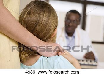 Stock Photo - doctor sitting 
at desk,  talking 
to patient,  focus 
on mother and. 
fotosearch - search 
stock photos, 
pictures, images, 
and photo clipart