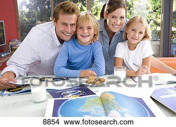 Stock Photo - parents by son 
and daughter (6-8) 
with homework, 
 smiling,  portrait. 
fotosearch - search 
stock photos, 
pictures, images, 
and photo clipart