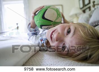 http://comps.fotosearch.com/comp/JCE/JCE148/boy-5-7-lying_~9758.jpg