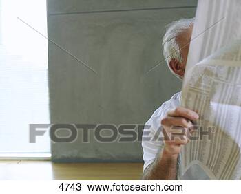 senior-man-reading_~4743.jpg