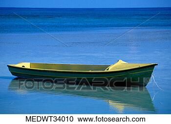 Stock Photography - caribbean, jamaica, 
fishing boat floating 
on water. fotosearch 
- search stock 
photos, pictures, 
images, and photo 
clipart