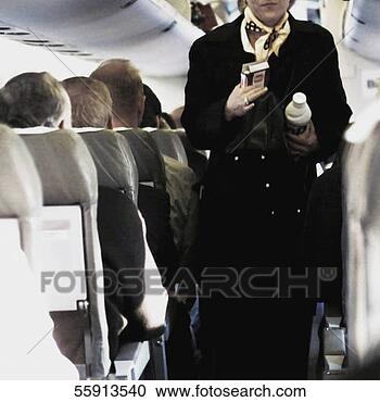 female-airline-stewardess_~55913540.jpg