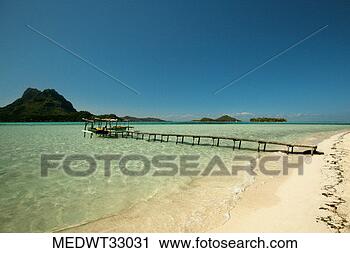 Stock Photography - french polynesia, 
bora bora, motu 
island, jetty 
over a sea. fotosearch 
- search stock 
photos, pictures, 
images, and photo 
clipart