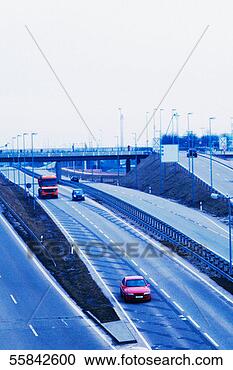 Stock Photography - high angle view 
of vehicles on 
a multiple lane 
highway. fotosearch 
- search stock 
photos, pictures, 
images, and photo 
clipart