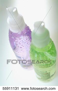 Stock Photography - high angle view 
of two bottles 
of perfume. fotosearch 
- search stock 
photos, pictures, 
images, and photo 
clipart