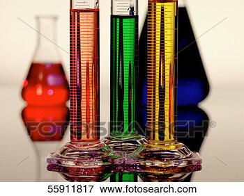 Picture - measuring cylinders 
and beaker filled 
with coloured 
liquid. fotosearch 
- search stock 
photos, pictures, 
images, and photo 
clipart