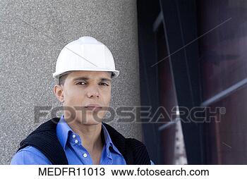 Stock Photo - portrait of a 
well-dressed latin 
man wearing a 
white hard hat. 
fotosearch - search 
stock photos, 
pictures, images, 
and photo clipart