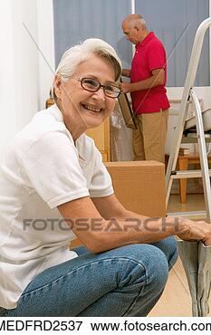 Picture - senior couple 
doing chores together, 
close-up. fotosearch 
- search stock 
photos, pictures, 
images, and photo 
clipart