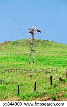 Stock Photography - usa, kansas, windmill 
in a field. fotosearch 
- search stock 
photos, pictures, 
images, and photo 
clipart