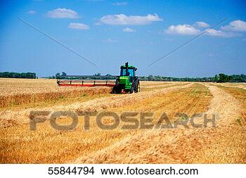 Stock Photo - usa, north dakota, 
tractor in a field. 
fotosearch - search 
stock photos, 
pictures, images, 
and photo clipart