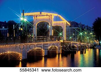 Stock Photography - bridge lit up 
at night, magere 
brug, amsterdam, 
netherlands. fotosearch 
- search stock 
photos, pictures, 
images, and photo 
clipart