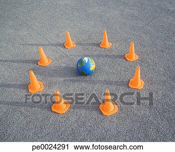 Stock Photography - globe on sand 
outdoors surrounded 
by traffic cones. 
fotosearch - search 
stock photos, 
pictures, images, 
and photo clipart
