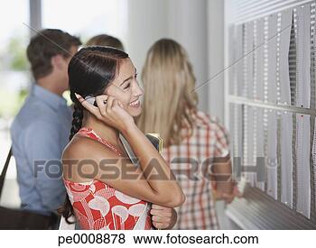 Stock Photo - teenage girl with 
cell phone and 
books at school. 
fotosearch - search 
stock photos, 
pictures, images, 
and photo clipart
