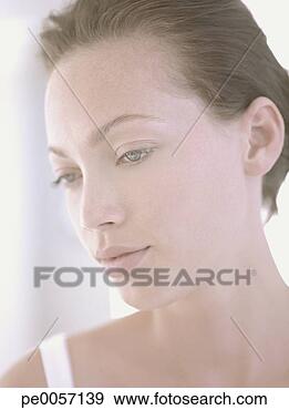 Stock Photograph - a woman looking 
serene. fotosearch 
- search stock 
photos, pictures, 
images, and photo 
clipart