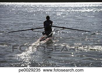 Stock Image - athlete on a small 
row boat. fotosearch 
- search stock 
photos, pictures, 
images, and photo 
clipart