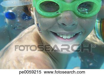 Stock Image - boy and girl wearing 
swim goggles underwater. 
fotosearch - search 
stock photos, 
pictures, images, 
and photo clipart