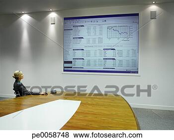 Stock Photo - businesswoman 
looking at large 
projection screen. 
fotosearch - search 
stock photos, 
pictures, images, 
and photo clipart