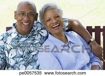 Stock Image - couple embracing 
outdoors. fotosearch 
- search stock 
photos, pictures, 
images, and photo 
clipart