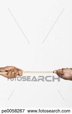 Picture - two hands pulling 
opposite ends 
of a rope. fotosearch 
- search stock 
photos, pictures, 
images, and photo 
clipart