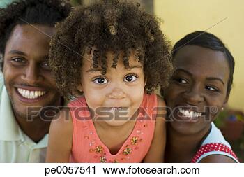 Stock Photography - young girl with 
couple holding 
her up. fotosearch 
- search stock 
photos, pictures, 
images, and photo 
clipart