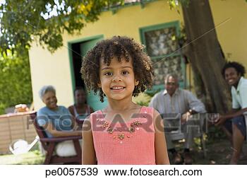 Stock Photograph - young girl with 
people in background. 
fotosearch - search 
stock photos, 
pictures, images, 
and photo clipart