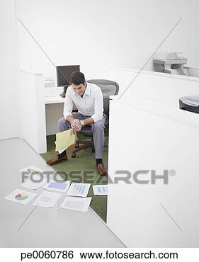 Stock Photo - businessman in 
office looking 
at charts on floor. 
fotosearch - search 
stock photos, 
pictures, images, 
and photo clipart