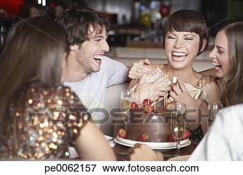 Picture - five people having 
fun and laughing 
at a birthday 
party in a. fotosearch 
- search stock 
photos, pictures, 
images, and photo 
clipart