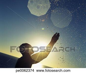 Stock Photo - man outdoor splashing 
in a body of water. 
fotosearch - search 
stock photos, 
pictures, images, 
and photo clipart