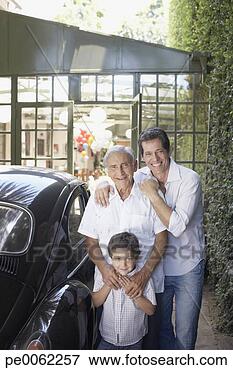 Picture - senior man with 
man and young 
boy outdoors standing 
beside car smiling. 
fotosearch - search 
stock photos, 
pictures, images, 
and photo clipart