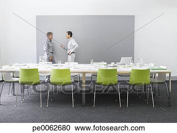 Stock Photography - businessmen working 
in conference 
room. fotosearch 
- search stock 
photos, pictures, 
images, and photo 
clipart