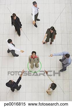 Stock Image - aerial view of 
businesswoman 
standing in circle 
with businesspeople. 
fotosearch - search 
stock photos, 
pictures, images, 
and photo clipart