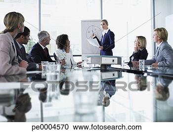 Stock Photography - businesspeople 
at meeting. fotosearch 
- search stock 
photos, pictures, 
images, and photo 
clipart