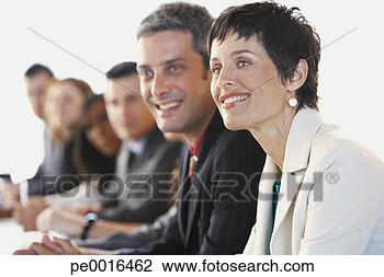 Stock Photo - businesspeople 
at meeting. fotosearch 
- search stock 
photos, pictures, 
images, and photo 
clipart