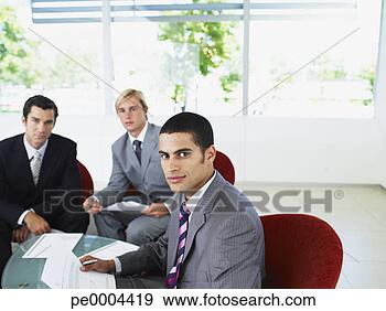 Stock Photograph - group of office 
workers in a meeting. 
fotosearch - search 
stock photos, 
pictures, images, 
and photo clipart