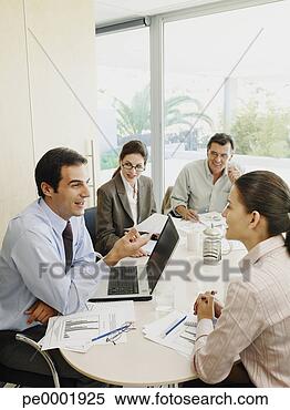 Stock Image - group of office 
workers in a meeting. 
fotosearch - search 
stock photos, 
pictures, images, 
and photo clipart