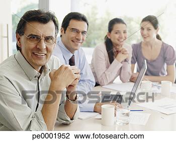 Stock Photo - group of office 
workers in a meeting. 
fotosearch - search 
stock photos, 
pictures, images, 
and photo clipart