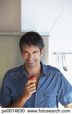 Stock Photography - man with fruit. 
fotosearch - search 
stock photos, 
pictures, images, 
and photo clipart