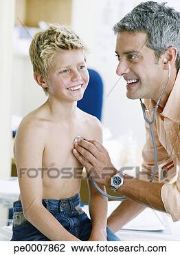 Stock Photo - boy with male 
doctor. fotosearch 
- search stock 
photos, pictures, 
images, and photo 
clipart