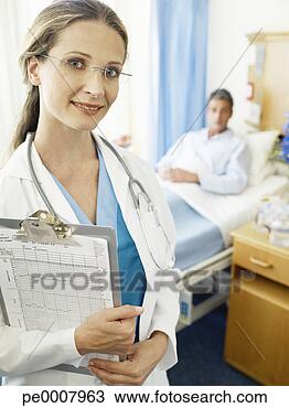 Stock Photo - female doctor 
or nurse in hospital 
with male patient. 
fotosearch - search 
stock photos, 
pictures, images, 
and photo clipart