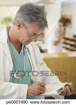 Stock Photography - male doctor with 
clipboard and 
stethoscope in 
hospital. fotosearch 
- search stock 
photos, pictures, 
images, and photo 
clipart