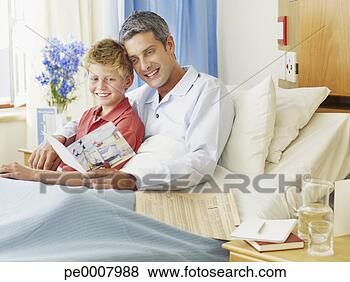 Stock Photo - man in hospital 
with son smiling. 
fotosearch - search 
stock photos, 
pictures, images, 
and photo clipart