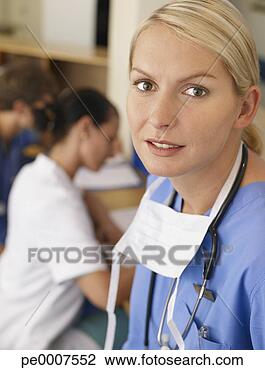 Stock Photo - nurse smiling. 
fotosearch - search 
stock photos, 
pictures, images, 
and photo clipart