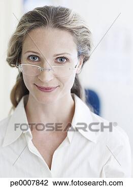 Stock Photo - portrait of a 
woman with eyeglasses. 
fotosearch - search 
stock photos, 
pictures, images, 
and photo clipart