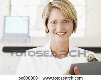 Stock Photography - woman with eyeglasses 
holding clipboard 
smiling. fotosearch 
- search stock 
photos, pictures, 
images, and photo 
clipart