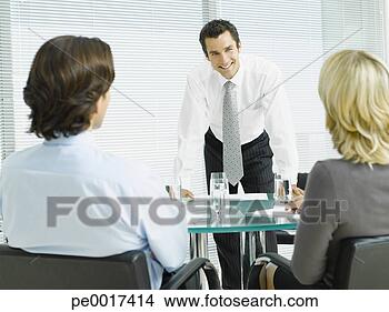 Stock Photo - businessman giving 
presentation. 
fotosearch - search 
stock photos, 
pictures, images, 
and photo clipart
