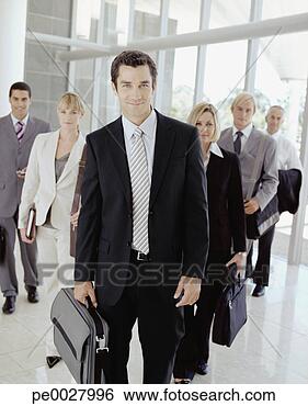 Stock Photo - group of businesspeople 
standing. fotosearch 
- search stock 
photos, pictures, 
images, and photo 
clipart