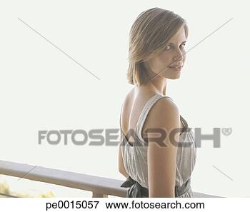Picture - woman smiling 
outdoors. fotosearch 
- search stock 
photos, pictures, 
images, and photo 
clipart