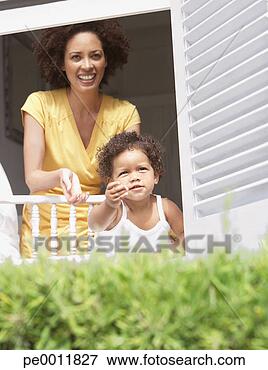 Picture - woman with daughter 
in summer. fotosearch 
- search stock 
photos, pictures, 
images, and photo 
clipart